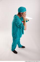 FALCO DOCTOR STANDING POSE WITH KNIFE